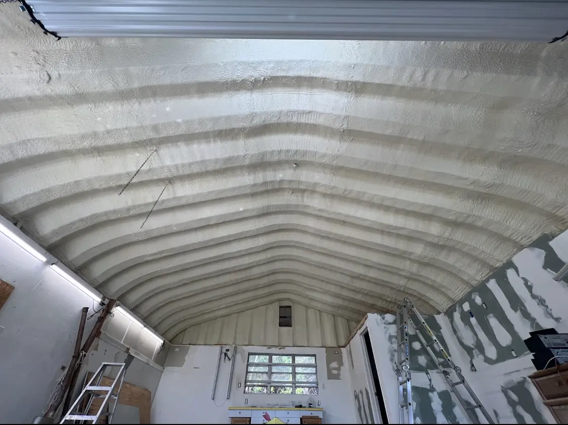 Spray polyurethane foam applied to the underside of a metal roof deck in Truckee